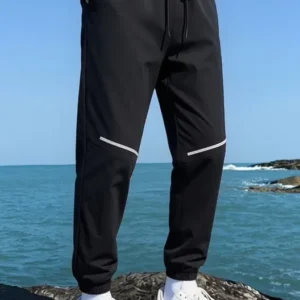 Herren Sportliche Jogginghose mit seitlichem Reißverschluss Echo Archiv
